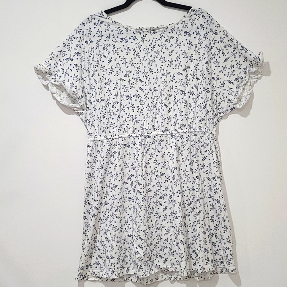 White dress with blue flowers